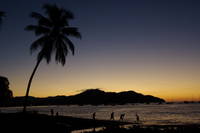 the sun sets on Playa Del Cocos